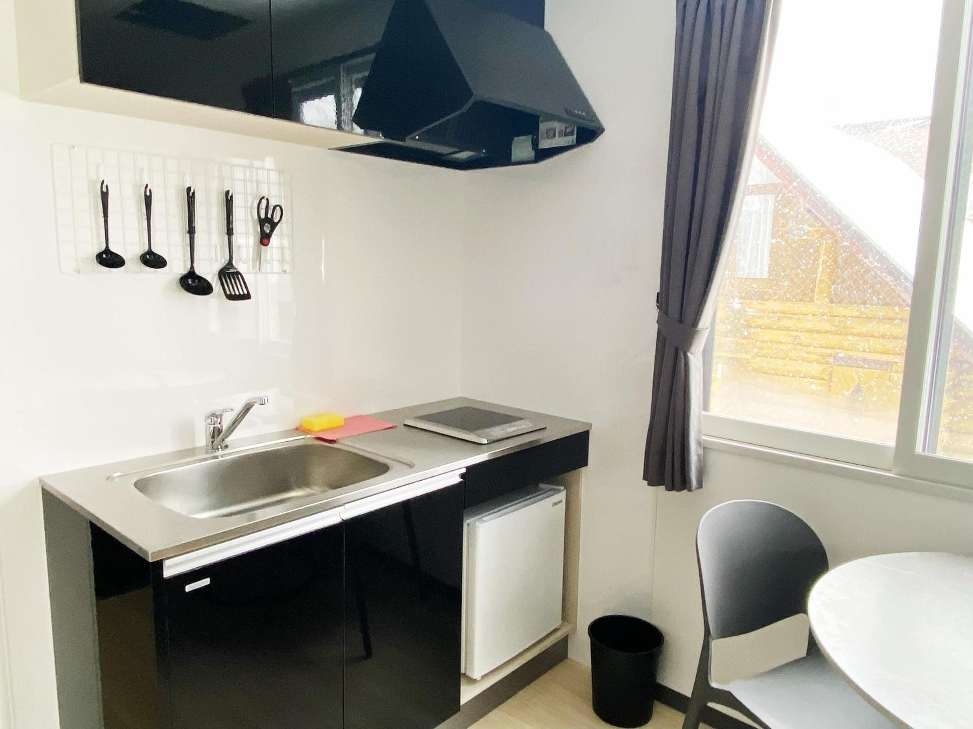 Q Fox Gmg Hotel Куттян Экстерьер фото